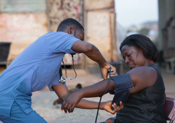 africa-humanitarian-aid-doctor-taking-care-patient